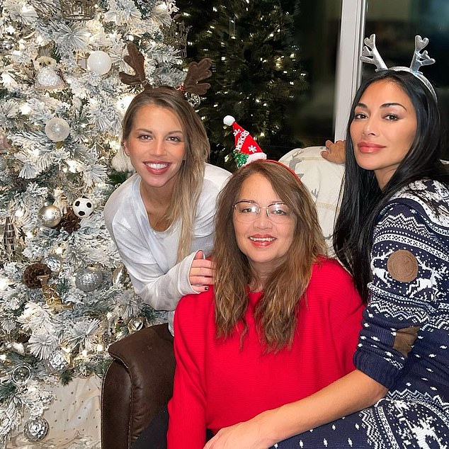 While Nicole grew up with a loving stepfather, Gary Scherzinger, who adopted her as a child and took her last name, the actress admitted that the abandonment still affected her (pictured with her mother Rosemary and sister Keala).