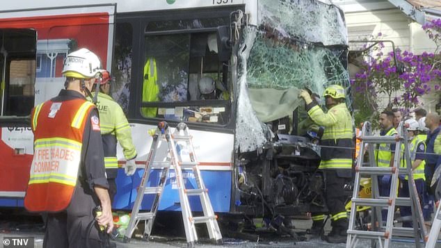 Rescue teams, including firefighters, were seen removing parts of the bus' damaged windshield to evacuate passengers (photo)