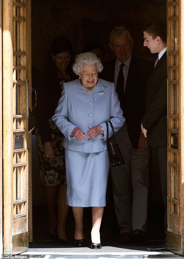 Queen Elizabeth II leaves the London Clinic after visiting her husband, Prince Philip, Duke of Edinburgh, June 15, 2013.