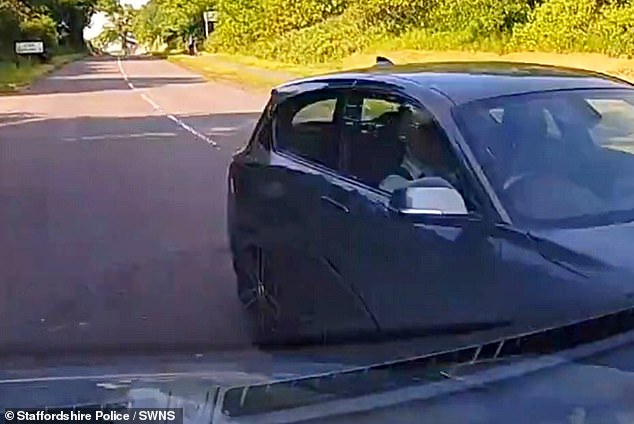 The terrifying video sees the BMW swerve into its lane at the last second, narrowly missing the other car.