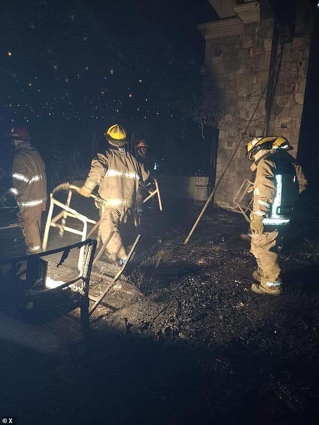 Firefighters quickly arrived on site to evacuate those present.  Although they extinguished the fire within two hours, they continued to work until the next morning to put out the smoldering debris (photo: firefighters on scene)