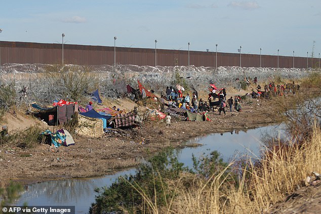 He is also expected to support Trump in the face of increased immigration at the southern border.  Migrants are seen here seeking asylum at the Ciudad Juarez border on March 19.