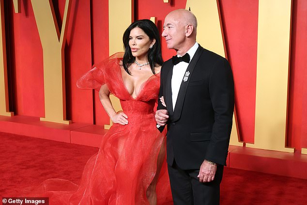 Bezos pictured with current partner Lauren Sanchez at the 2024 Vanity Fair Oscars party