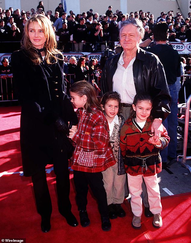 At the time, Hugh was married to Kimberly and they had children;  seen at the premiere of Star Wars: Special Edition in 1997 in Los Angeles