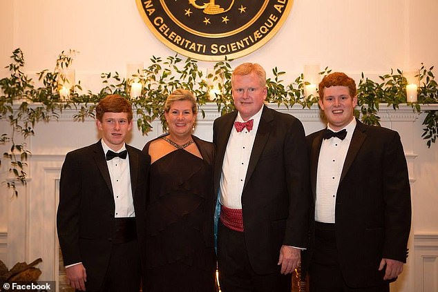 The disgraced lawyer attempted to use his late mother Libby as an alibi for the murders of his wife and son. He is pictured with his wife Maggie and their two sons Paul (left) and Buster