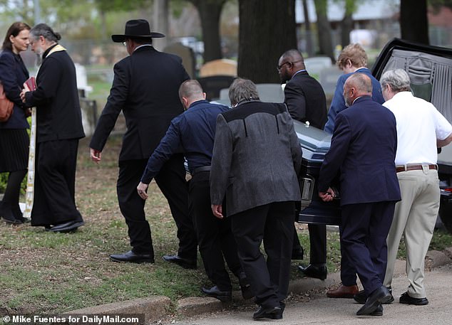 Mourners for Paul Alexander, the man who lived most of his life in an iron lung, cry at his funeral in Dallas