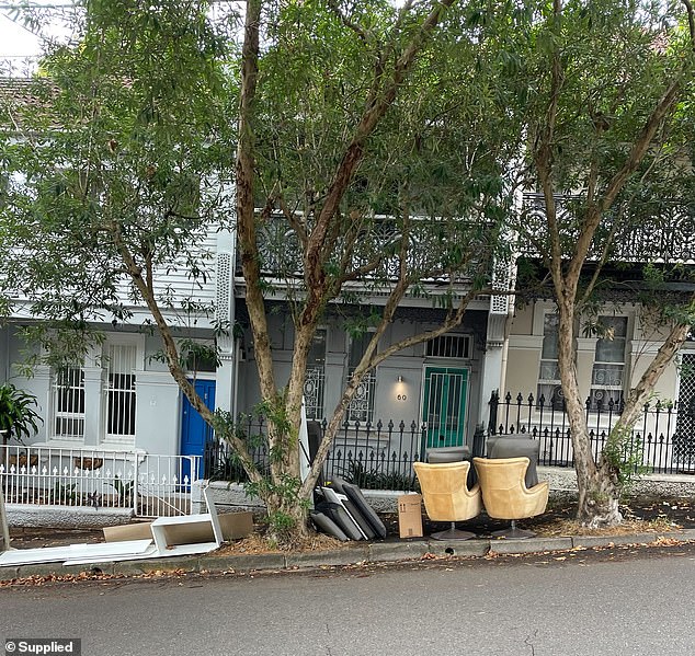 Pictured: Furniture and household items outside the rental where Jesse Baird lived