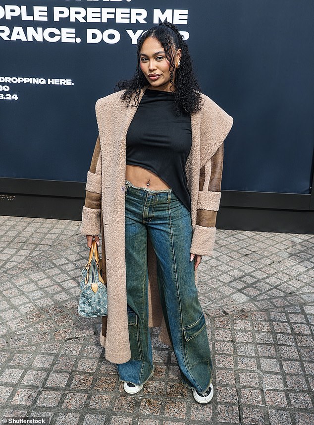 Ella Thomas, 23, from the same series as Molly, also showed off her abs in a black tee which she paired with blue jeans and a brown coat.