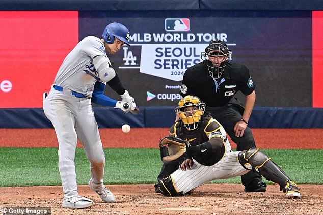 Ohtani's RBI single capped a four-run eighth-inning rally as the Dodgers beat the Padres 5-2