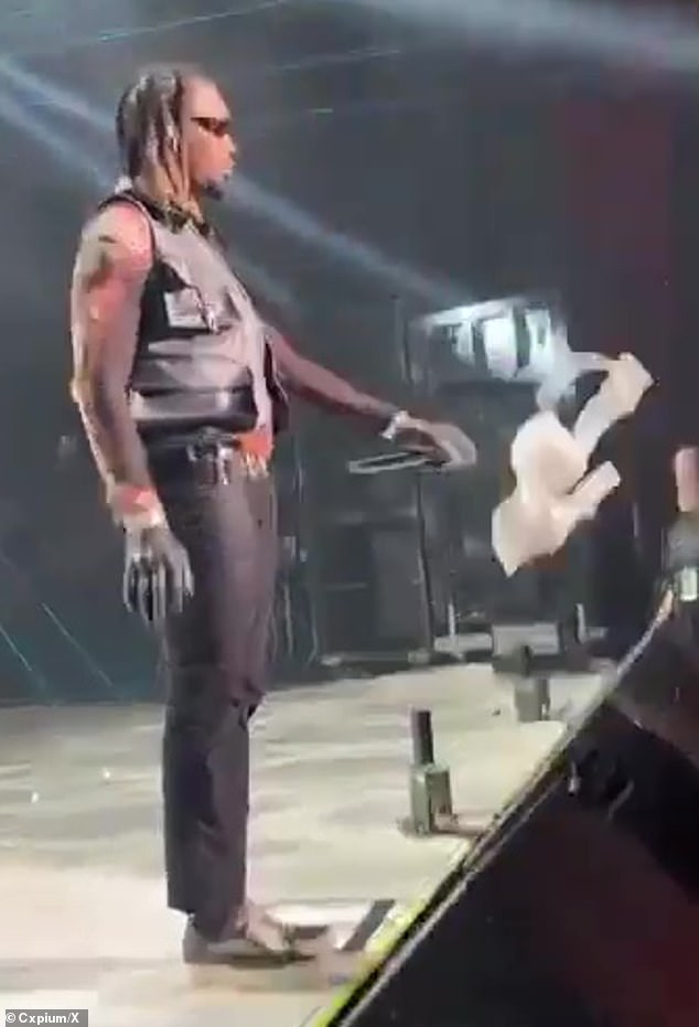The Migos member didn't miss a beat as he continued to rap his Kodak Black and Travis Scott song Zeze to the audience while gently tossing the underwear.
