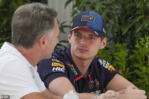 There have been reports casting doubt on Verstappen's (right) future with the team