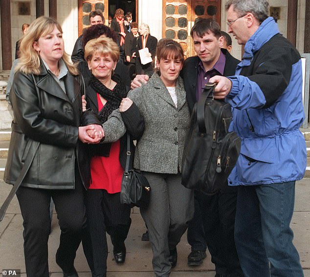 Hewins (centre) pictured after leaving the Court of Appeal in London in 1999 with friends and family; she gave birth to her youngest son while in prison