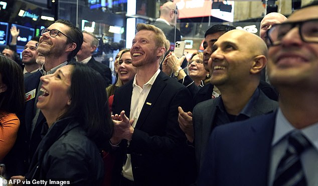 CEO and co-founder Steve Huffman (pictured, middle) visited Wall Street on Thursday morning.