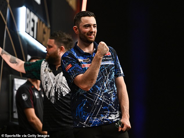 1711062569 760 Luke Littler loses to Michael Smith in first round of
