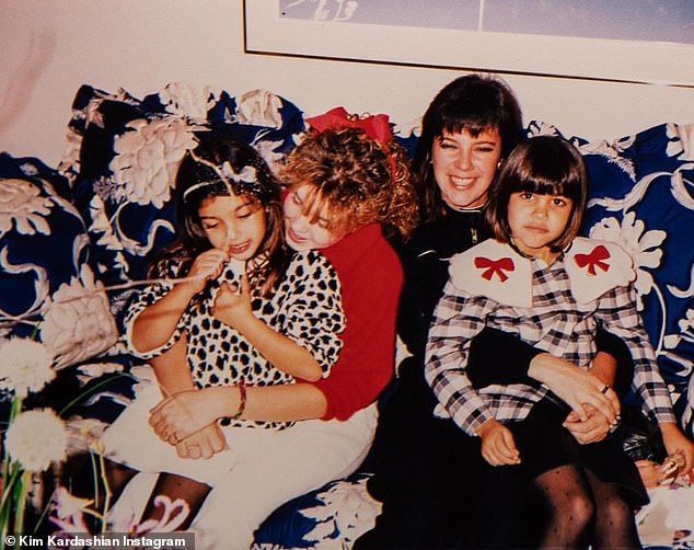 She also shared a photo of her and her sister Kourtney sitting on the couch with their aunt.