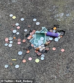 Some who have made the pilgrimage to the famous rat hole have left offerings, such as money (pictured above) at the rodent's footprint.