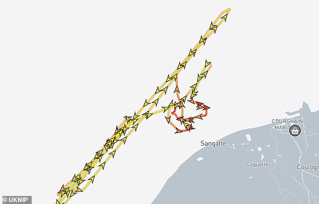 The boat was launched yesterday from Sangatte beach, near Calais, in the north of France. Pictured: A tracker shows a French patrol boat changing course to intercept the boat off Sangatte.