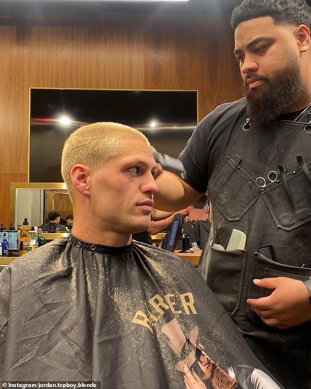 Jordan Magasiva, the barber who left Billy sleeping, is seen here (pictured right) cutting NRL superstar Kalyn Ponga.