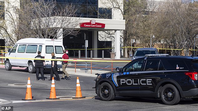 A police vehicle is parked in front of Saint Alphonsus Regional Medical Center in Boise, Idaho, Wednesday, March 20, 2024.