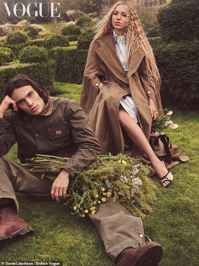 She was joined by fellow model Louis Baines, as they posed in the sculpted grounds of an Edenic country house, with Lila showing off her toned legs in a Burberry shirtdress and cape.