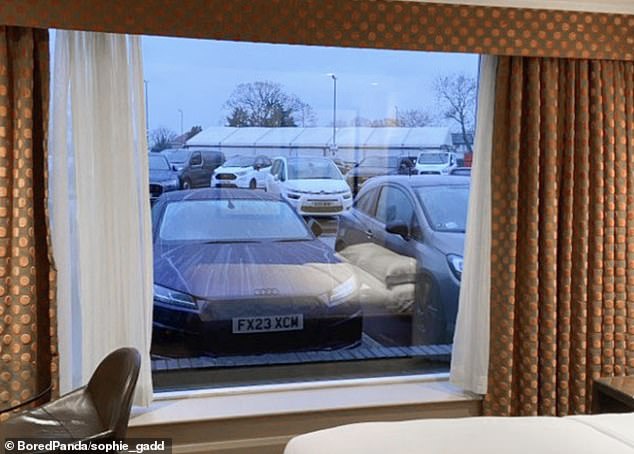 Instead of a view of the pool or an exotic beach, a hotel guest was treated to an unglamorous view of the parking lot from his hotel room.