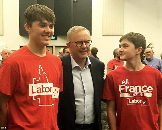 Henry (left) and his younger brother Zac France are seen with Prime Minister Anthony Albanese