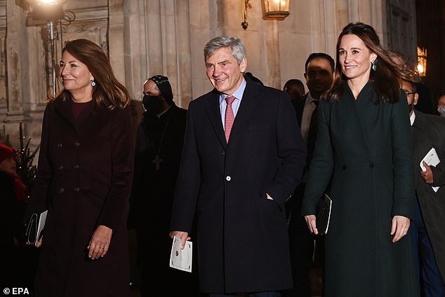 (L-R) Carole Middleton, Michael Middleton and Pippa Matthews leave after attending the 'Together at Christmas' carol service at Westminster Abbey on December 8, 2021