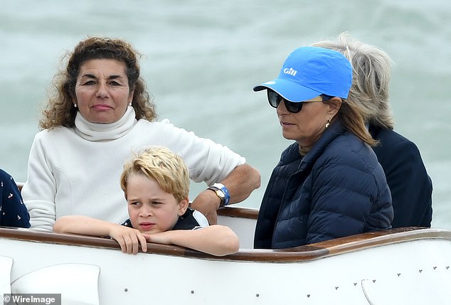 Prince George and Carole Middleton (R) attend the King's Cup Regatta on August 8, 2019 in Cowes