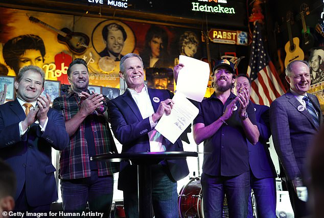 Tennessee Gov. Bill Lee rubbed shoulders with country stars including Bryan at the classic Broadway honky-tonk Robert's Western World on Thursday