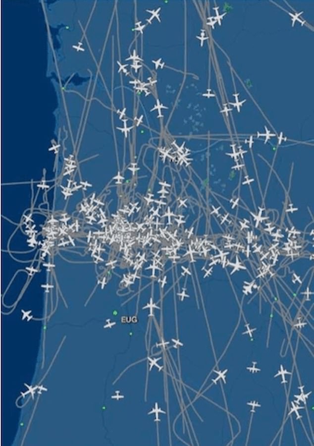 An Oregon air traffic controller said the surge in traffic during the 2017 eclipse was incredible and made for a crazy day — pictures of planes show hundreds of planes traveling in the sky at once