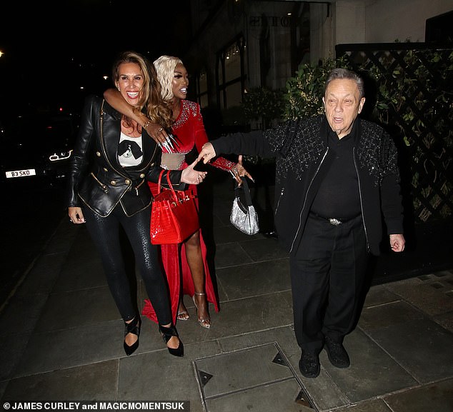 Ampika looked worse for wear as she emerged from Scott's restaurant in Mayfair arm-in-arm with Lystra, while David, 75, made his way to their taxi