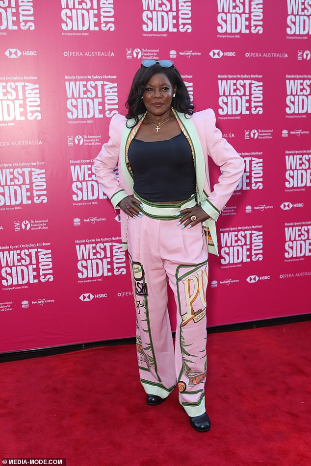 Marcia (pictured), meanwhile, also went for pink, opting for a pastel blazer and matching slacks with a graphic pop-art print