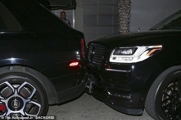 The exit was smoother than the arrival as the reality star's driver crashed into Kris' $400,000 Rolls Royce Ghost, which was parked in the next bay