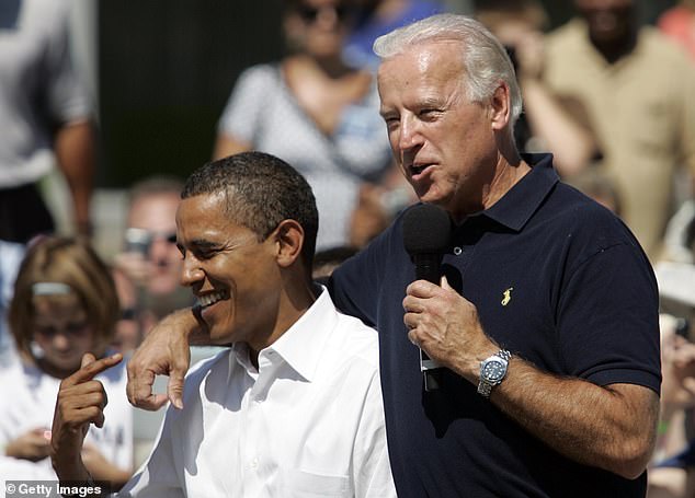 Then-Democratic nominee Barack Obama (left) and his running mate, now President Joe Biden (right), campaign in Ohio in 2008