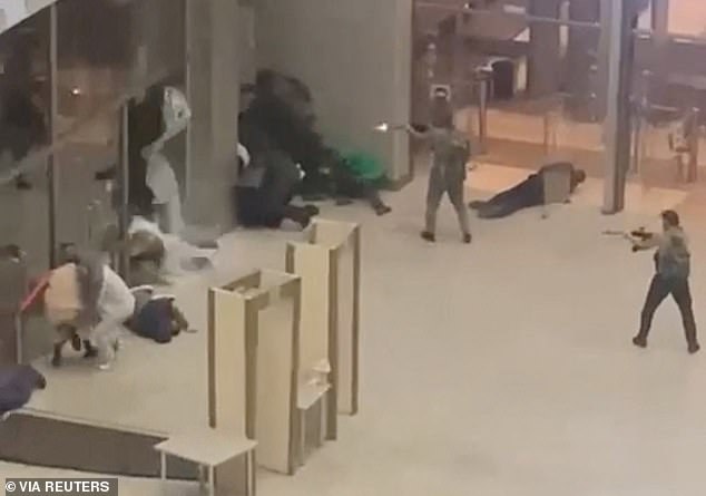 Multiple gunmen burst into a major concert hall in Moscow and fired automatic weapons into the crowd, injuring more than 100 people and setting a massive fire in an apparent terror attack