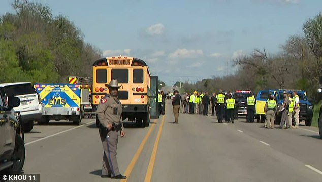 The Texas Department of Public Safety said the cement truck plowed into the school bus just before a driver in a Dodge Charger crashed into the bus. (pictured: another bus arriving at the scene)