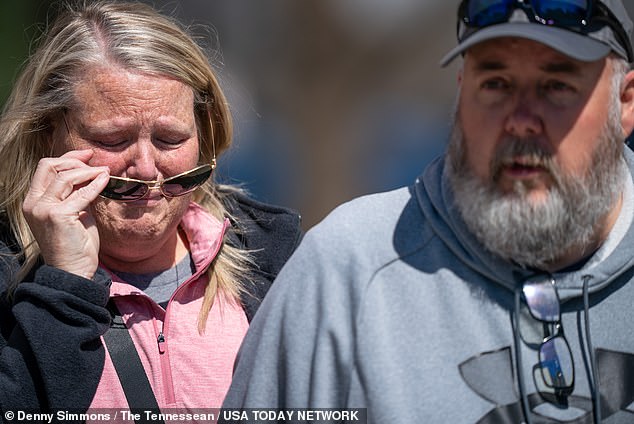 Michelle Strain Whiteid, left, and her husband, Chris Whiteid, speak to the media during a press conference earlier this week