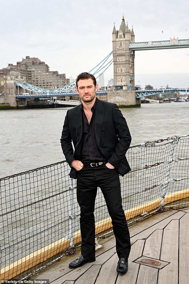 Magic Mike star Alex, 33, looked dapper in an all black look with a slightly unbuttoned shirt
