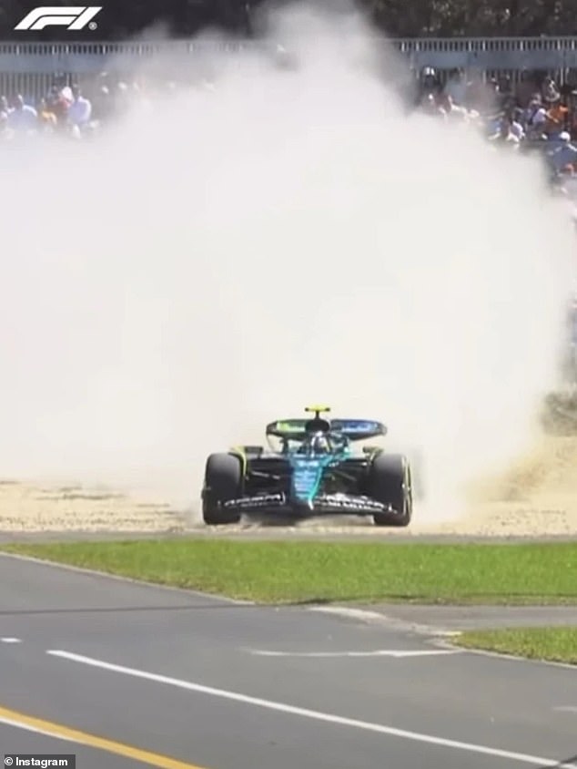 Fernando Alonso took a wide turn and kicked up gravel and dirt as he went off the track