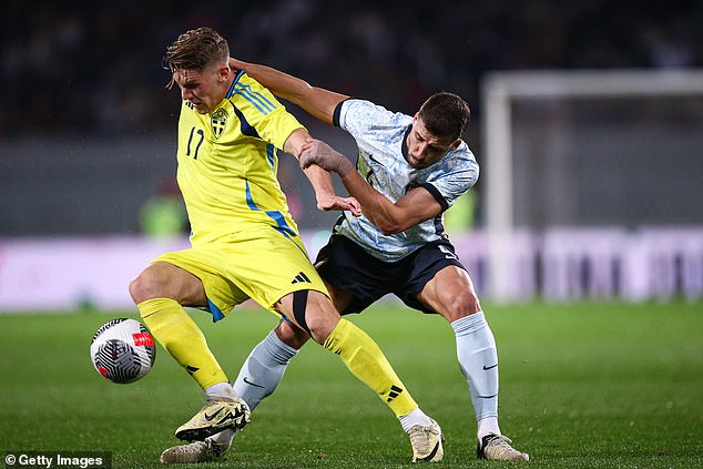 Man City defender Ruben Dias, right, will play no part in Portugal's friendly against Slovenia