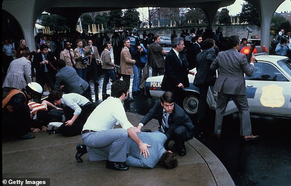 Press secretary James Brady and agent Timothy McCarthy were injured in the assassination attempt on Reagan.  The aftermath of the shooting is seen above.