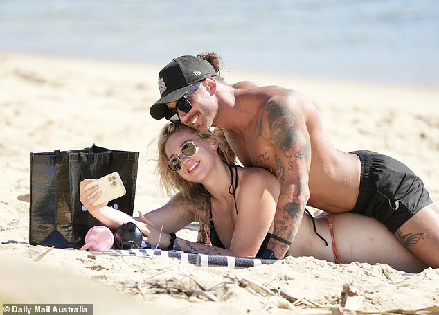 The controversial couple were also seen taking a series of selfies while Jack lay on top of Tori on the beach.
