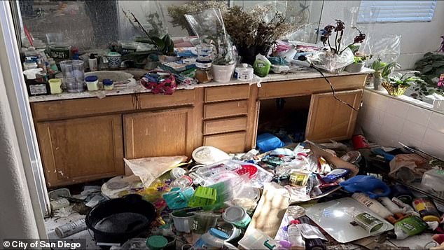 Investigators said they were shocked by the disgusting home owned by Lisa Golden, which was filled with trash piled several feet high, rotting food and a rat infestation.