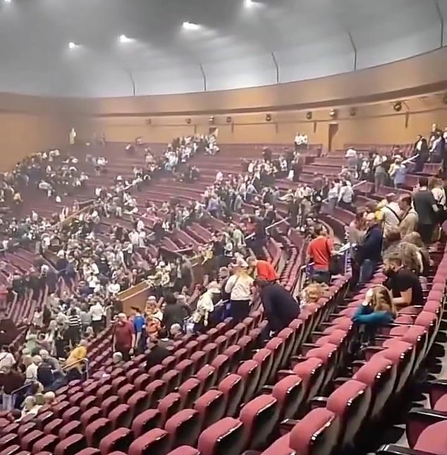 A video shows people evacuating Crocus City Hall in the Russian capital, where a sold-out concert by rock band Piknik was hosted.