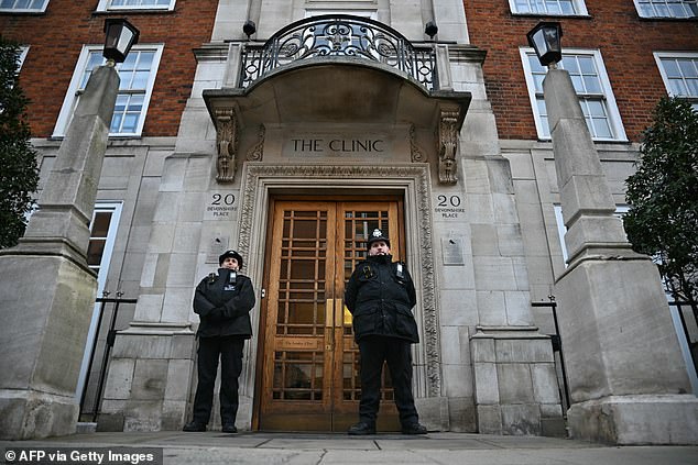 The diagnosis came after the future Queen underwent abdominal surgery at The London Clinic in January. Pictured: Police officers stand guard outside the building on January 28.