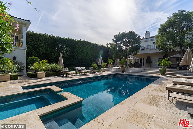 The Mediterranean-style villa, located in the trendy Beverly Hills 90210 zip code, features a refreshing Jacuzzi pool out back.