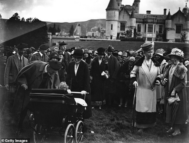 The royal garden party at Balmoral.  From left to right are: the Duke of York, King George V, Queen Mary and the Duchess of York.  Princess Elizabeth is in the stroller.
