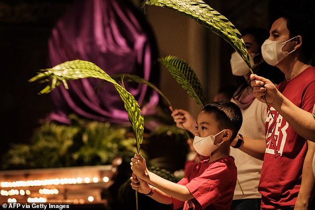 Christians celebrating Palm Sunday inside the Jakarta Cathedral, Indonesia