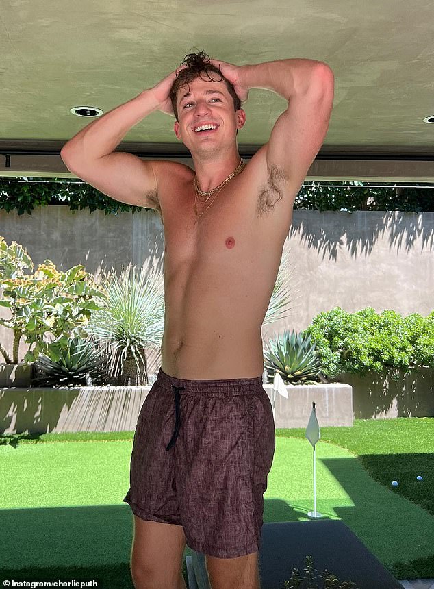 Singer-songwriter and Grammy nominee Charlie Puth posing next to a golf course in August 2022