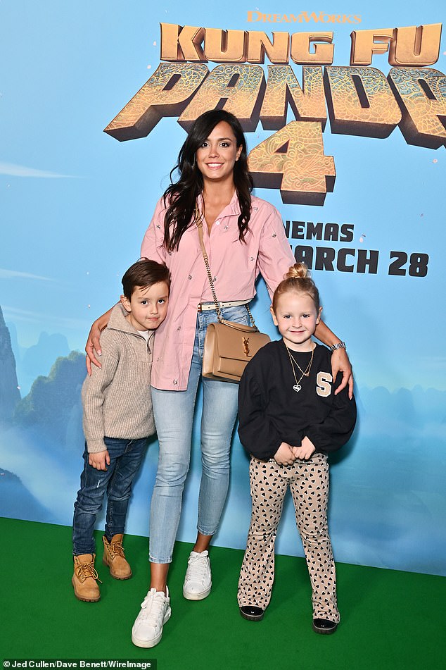 Love Island star Tyla Carr brought her son Archie, five, looking casual in an embellished pink shirt and jeans.